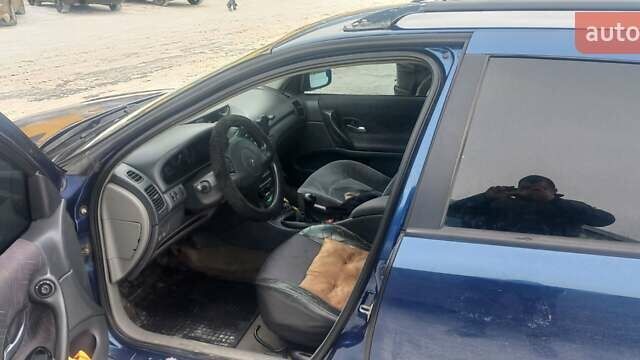 Синий Рено Лагуна, объемом двигателя 1.9 л и пробегом 408 тыс. км за 3000 $, фото 5 на Automoto.ua