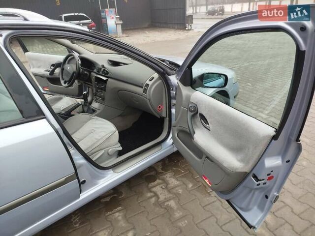 Синій Рено Лагуна, об'ємом двигуна 1.8 л та пробігом 154 тис. км за 4000 $, фото 25 на Automoto.ua