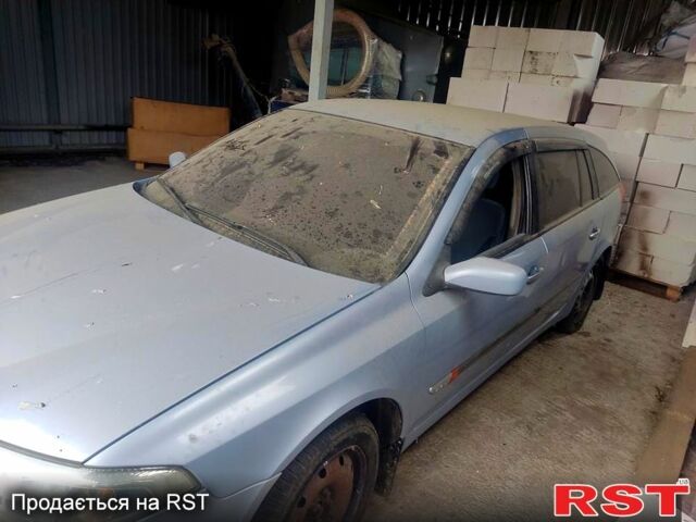 Синий Рено Лагуна, объемом двигателя 2 л и пробегом 280 тыс. км за 1800 $, фото 4 на Automoto.ua