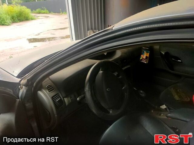Синий Рено Лагуна, объемом двигателя 2 л и пробегом 280 тыс. км за 1800 $, фото 1 на Automoto.ua