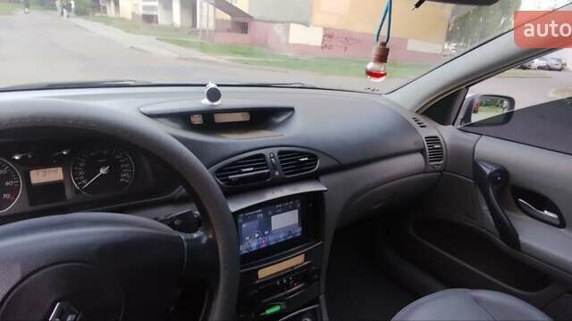 Синій Рено Лагуна, об'ємом двигуна 1.8 л та пробігом 279 тис. км за 5200 $, фото 3 на Automoto.ua