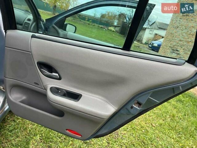 Синий Рено Лагуна, объемом двигателя 2.19 л и пробегом 308 тыс. км за 3400 $, фото 24 на Automoto.ua