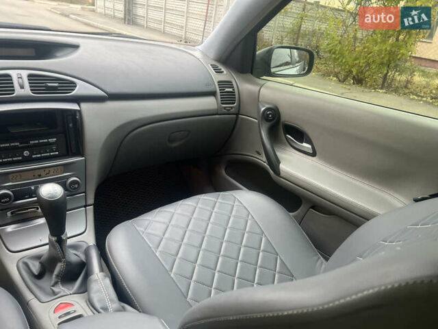 Синий Рено Лагуна, объемом двигателя 2 л и пробегом 293 тыс. км за 4400 $, фото 12 на Automoto.ua