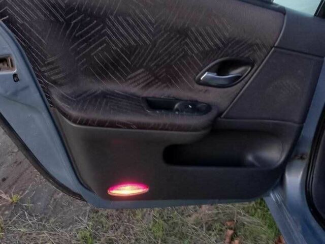 Синий Рено Лагуна, объемом двигателя 2 л и пробегом 340 тыс. км за 3650 $, фото 5 на Automoto.ua