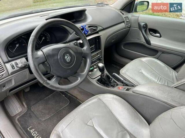 Синий Рено Лагуна, объемом двигателя 2.19 л и пробегом 308 тыс. км за 3400 $, фото 33 на Automoto.ua