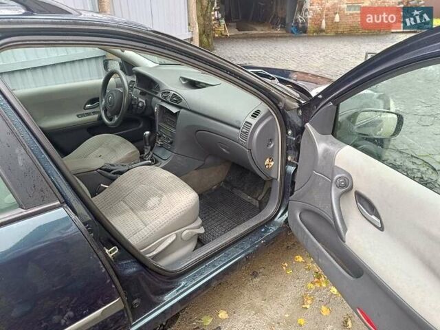 Синий Рено Лагуна, объемом двигателя 1.8 л и пробегом 308 тыс. км за 2400 $, фото 8 на Automoto.ua