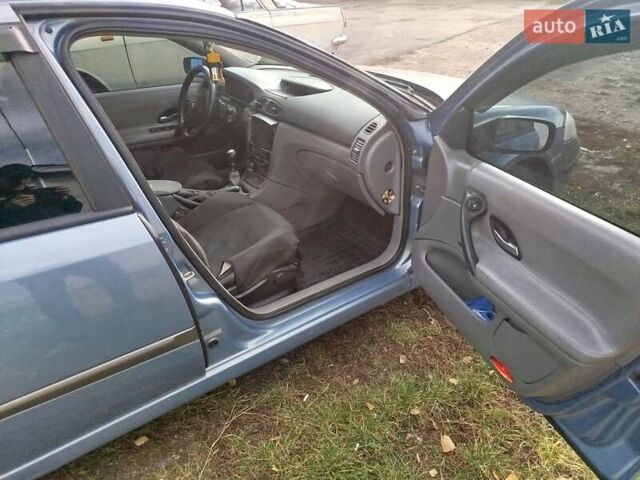 Рено Лагуна 2004 в Волочиске на Automoto.ua Синий Рено Лагуна, объемом двигателя 1.9 л и пробегом 281 тыс. км за 3200 $, фото 38 на Automoto.ua