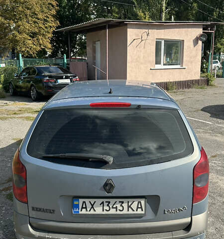 Синий Рено Лагуна, объемом двигателя 2 л и пробегом 309 тыс. км за 4000 $, фото 3 на Automoto.ua