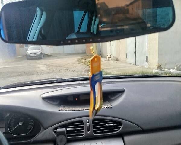 Рено Лагуна 2004 в Волочиске на Automoto.ua Синий Рено Лагуна, объемом двигателя 1.9 л и пробегом 281 тыс. км за 3200 $, фото 19 на Automoto.ua