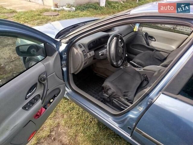 Рено Лагуна 2004 в Волочиске на Automoto.ua Синий Рено Лагуна, объемом двигателя 1.9 л и пробегом 281 тыс. км за 3200 $, фото 15 на Automoto.ua