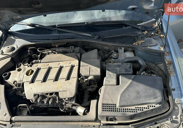 Синій Рено Лагуна, об'ємом двигуна 2 л та пробігом 309 тис. км за 4000 $, фото 9 на Automoto.ua