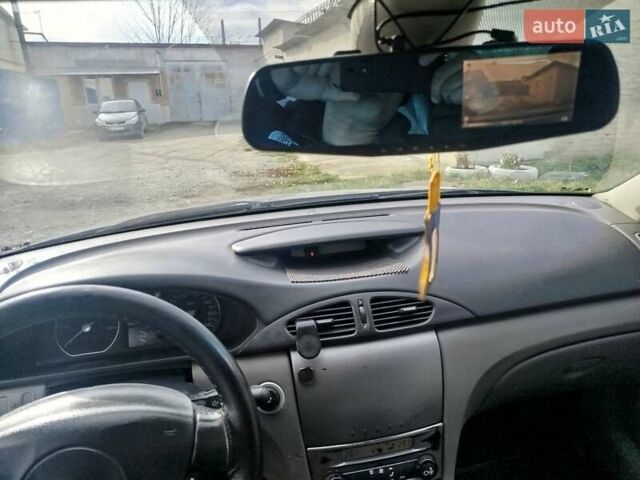 Рено Лагуна 2004 в Волочиске на Automoto.ua Синий Рено Лагуна, объемом двигателя 1.9 л и пробегом 281 тыс. км за 3200 $, фото 16 на Automoto.ua