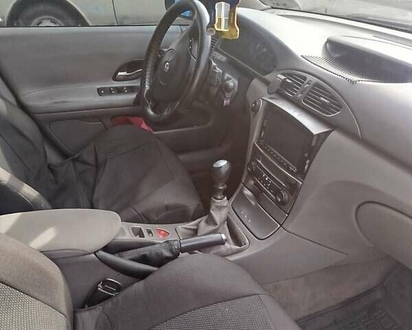 Рено Лагуна 2004 в Волочиске на Automoto.ua Синий Рено Лагуна, объемом двигателя 1.9 л и пробегом 281 тыс. км за 3200 $, фото 14 на Automoto.ua