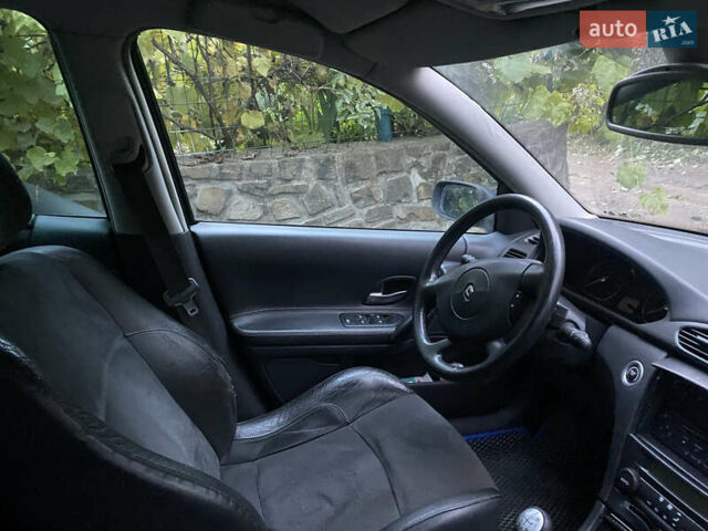 Синий Рено Лагуна, объемом двигателя 2 л и пробегом 240 тыс. км за 4800 $, фото 10 на Automoto.ua