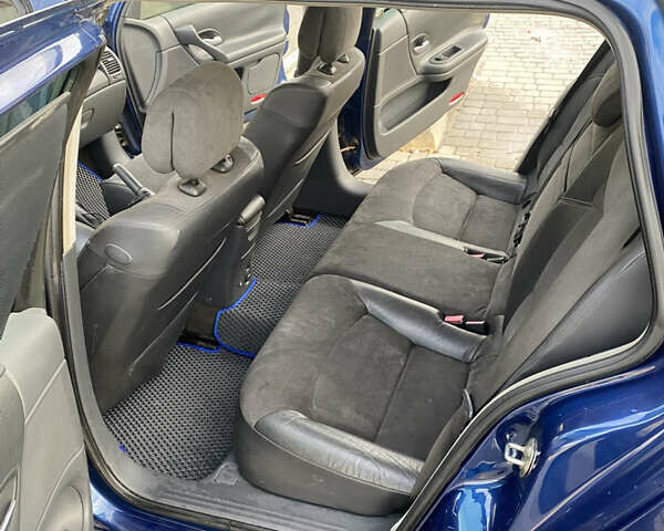 Синий Рено Лагуна, объемом двигателя 2 л и пробегом 240 тыс. км за 4800 $, фото 12 на Automoto.ua