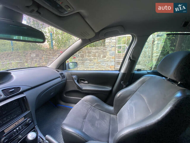 Синий Рено Лагуна, объемом двигателя 2 л и пробегом 240 тыс. км за 4800 $, фото 11 на Automoto.ua