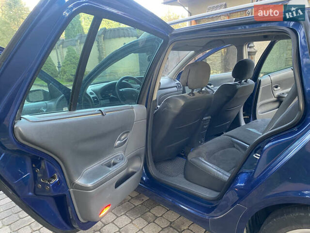 Синій Рено Лагуна, об'ємом двигуна 2 л та пробігом 240 тис. км за 4800 $, фото 5 на Automoto.ua