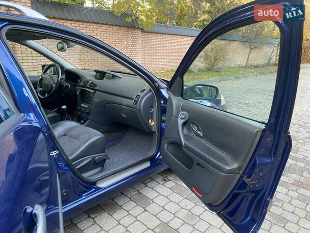 Синий Рено Лагуна, объемом двигателя 2 л и пробегом 240 тыс. км за 4800 $, фото 6 на Automoto.ua