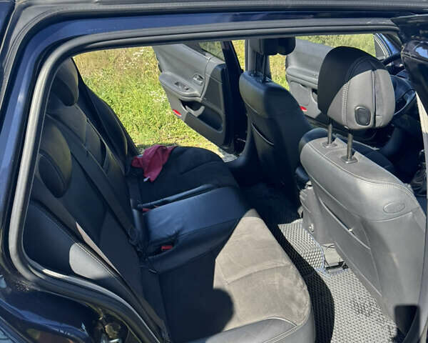 Синий Рено Лагуна, объемом двигателя 2 л и пробегом 223 тыс. км за 5000 $, фото 18 на Automoto.ua