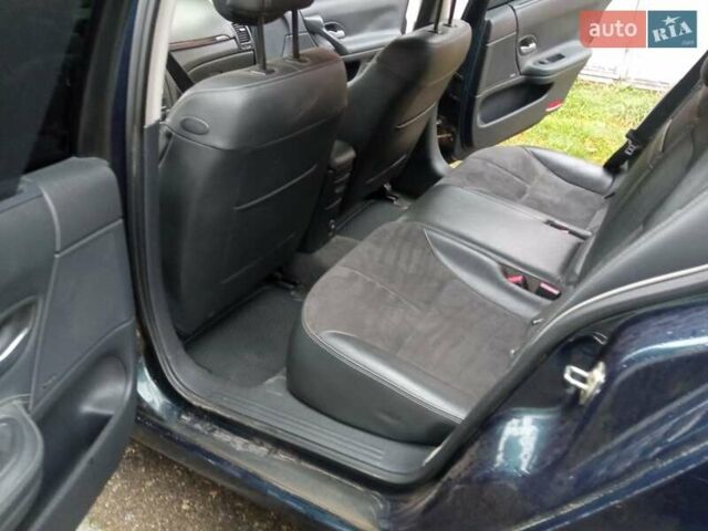 Синий Рено Лагуна, объемом двигателя 2.02 л и пробегом 268 тыс. км за 4700 $, фото 5 на Automoto.ua