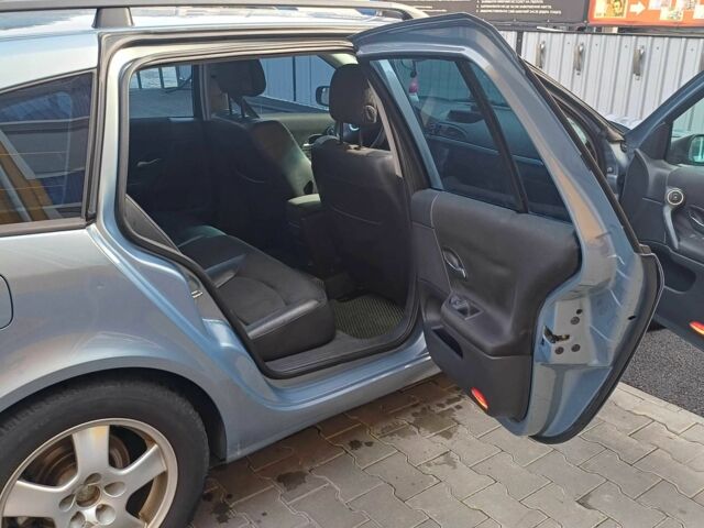 Синий Рено Лагуна, объемом двигателя 2 л и пробегом 322 тыс. км за 4300 $, фото 13 на Automoto.ua