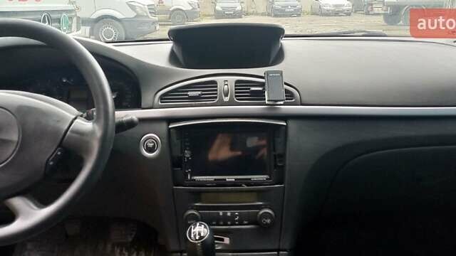 Синий Рено Лагуна, объемом двигателя 1.6 л и пробегом 321 тыс. км за 2300 $, фото 13 на Automoto.ua