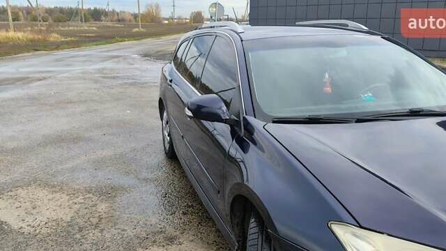 Рено Лагуна 2008 в Каменское - Днепродзержинск на Automoto.ua Синий Рено Лагуна, объемом двигателя 1.46 л и пробегом 276 тыс. км за 6400 $, фото 10 на Automoto.ua