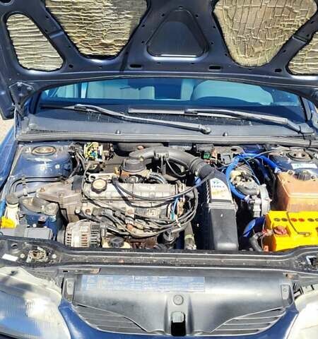 Синий Рено Лагуна, объемом двигателя 1.79 л и пробегом 300 тыс. км за 1850 $, фото 16 на Automoto.ua