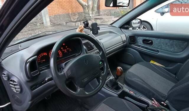 Синий Рено Лагуна, объемом двигателя 1.8 л и пробегом 165 тыс. км за 2700 $, фото 8 на Automoto.ua