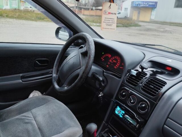 Синій Рено Лагуна, об'ємом двигуна 1.8 л та пробігом 270 тис. км за 1900 $, фото 6 на Automoto.ua