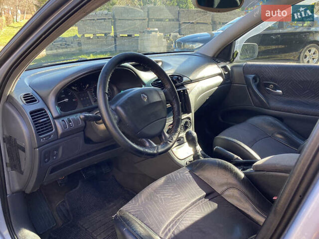 Синий Рено Лагуна, объемом двигателя 1.9 л и пробегом 380 тыс. км за 2650 $, фото 16 на Automoto.ua