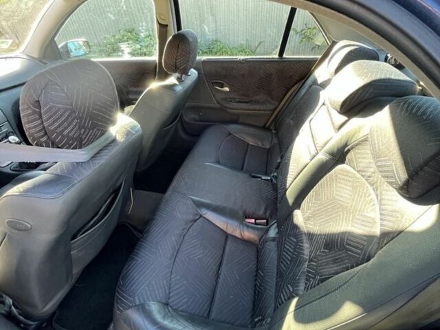 Синий Рено Лагуна, объемом двигателя 1.8 л и пробегом 171 тыс. км за 1500 $, фото 7 на Automoto.ua