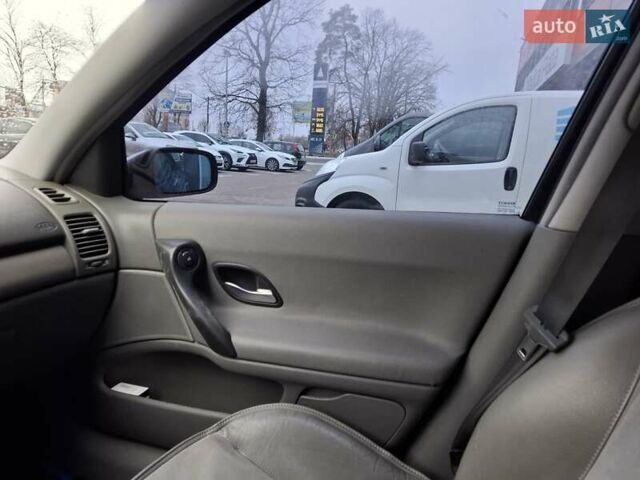 Синій Рено Лагуна, об'ємом двигуна 1.8 л та пробігом 239 тис. км за 3600 $, фото 14 на Automoto.ua