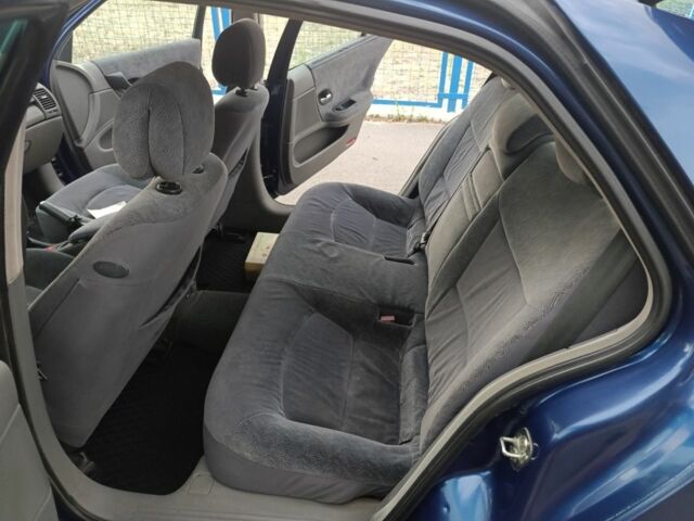 Синий Рено Лагуна, объемом двигателя 1.6 л и пробегом 326 тыс. км за 3300 $, фото 8 на Automoto.ua