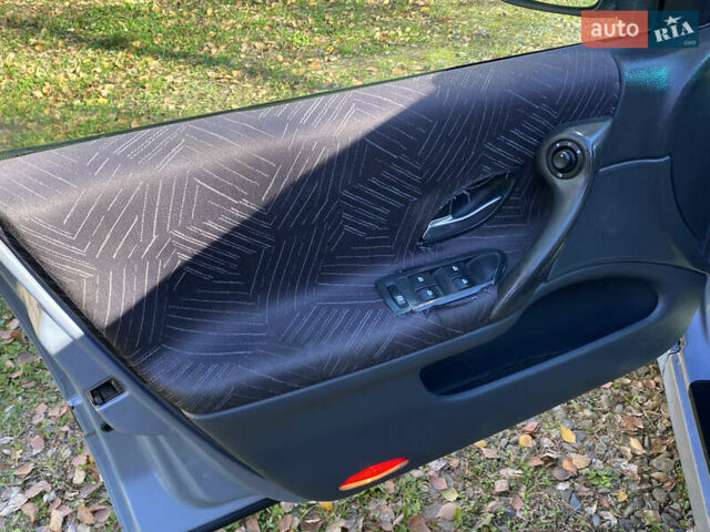 Синий Рено Лагуна, объемом двигателя 1.9 л и пробегом 380 тыс. км за 2650 $, фото 21 на Automoto.ua