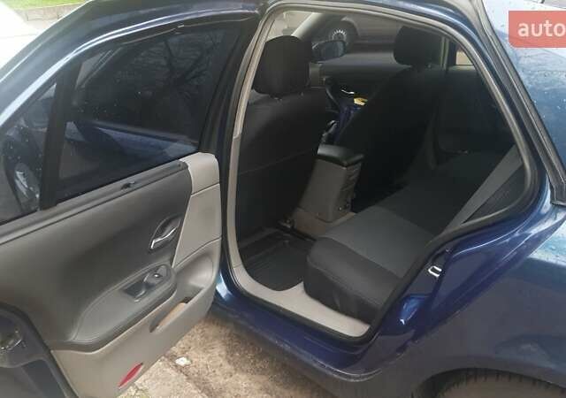 Синий Рено Лагуна, объемом двигателя 2 л и пробегом 275 тыс. км за 4500 $, фото 11 на Automoto.ua