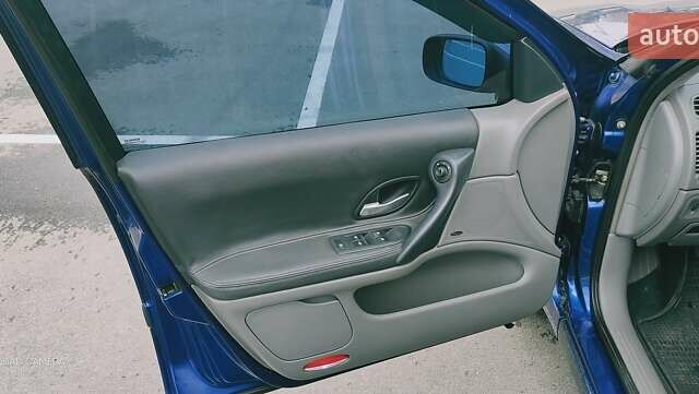 Синий Рено Лагуна, объемом двигателя 2 л и пробегом 275 тыс. км за 4500 $, фото 4 на Automoto.ua