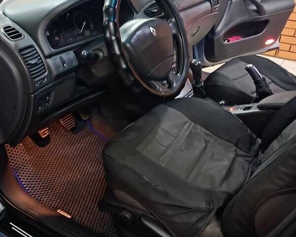 Синий Рено Лагуна, объемом двигателя 1.79 л и пробегом 213 тыс. км за 3700 $, фото 6 на Automoto.ua