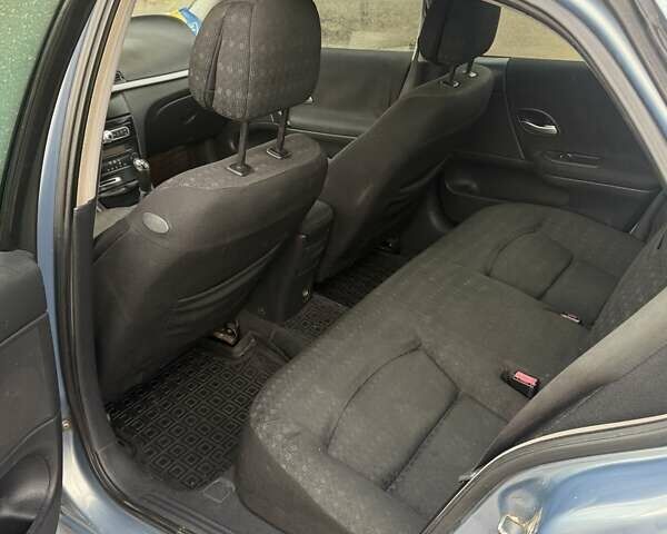 Рено Лагуна 2006 в Ровно на Automoto.ua Синий Рено Лагуна, объемом двигателя 1.6 л и пробегом 300 тыс. км за 3299 $, фото 16 на Automoto.ua