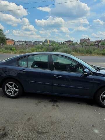 Синій Рено Лагуна, об'ємом двигуна 2 л та пробігом 221 тис. км за 5600 $, фото 7 на Automoto.ua