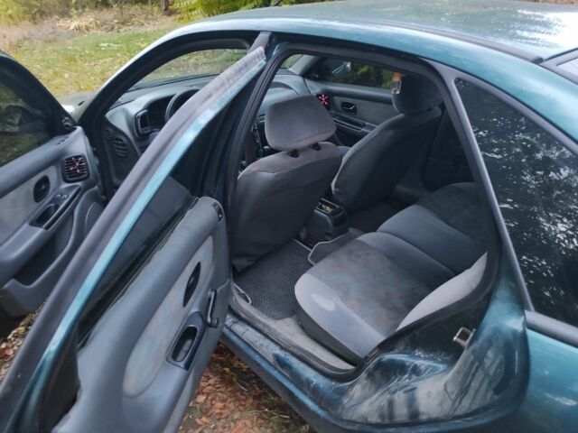 Рено Лагуна 1995 в Днепре (Днепропетровске) на Automoto.ua Зеленый Рено Лагуна, объемом двигателя 1.8 л и пробегом 353 тыс. км за 1000 $, фото 6 на Automoto.ua