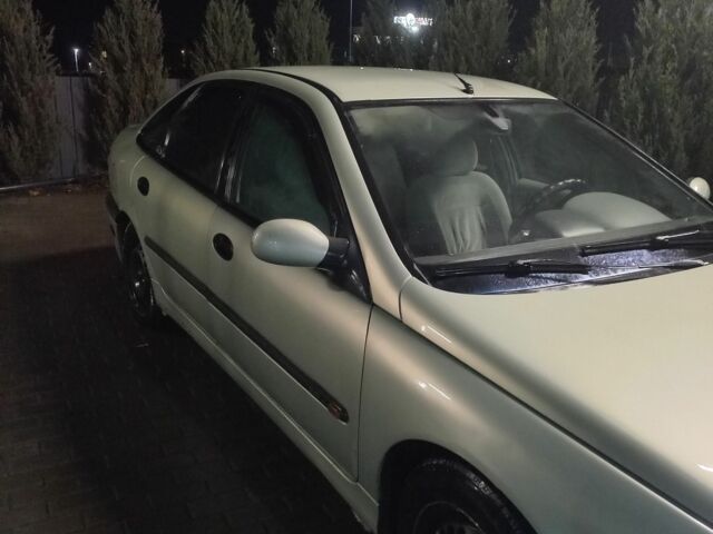 Зеленый Рено Лагуна, объемом двигателя 2 л и пробегом 380 тыс. км за 1700 $, фото 1 на Automoto.ua