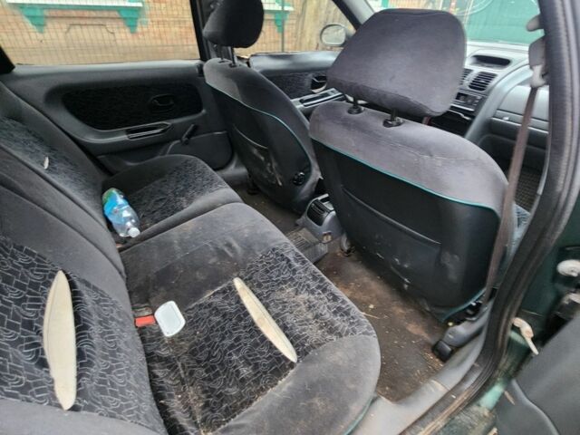 Зелений Рено Лагуна, об'ємом двигуна 1.8 л та пробігом 300 тис. км за 485 $, фото 5 на Automoto.ua