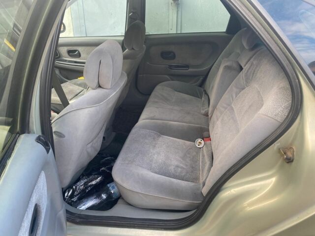 Зелений Рено Лагуна, об'ємом двигуна 1.8 л та пробігом 95 тис. км за 2000 $, фото 13 на Automoto.ua