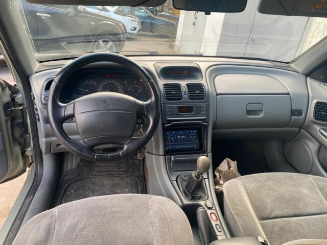 Зелений Рено Лагуна, об'ємом двигуна 1.8 л та пробігом 95 тис. км за 2000 $, фото 12 на Automoto.ua