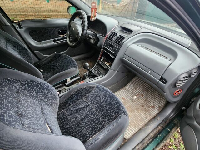 Зелений Рено Лагуна, об'ємом двигуна 1.8 л та пробігом 300 тис. км за 485 $, фото 7 на Automoto.ua