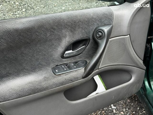 Зелений Рено Лагуна, об'ємом двигуна 1.9 л та пробігом 250 тис. км за 2940 $, фото 13 на Automoto.ua