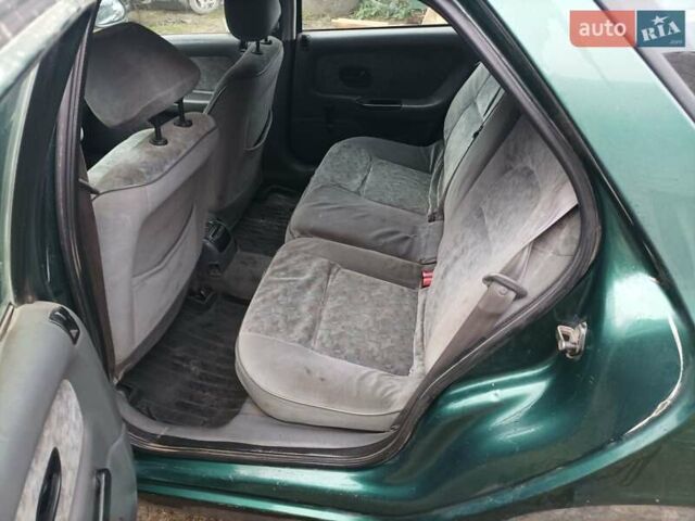 Зеленый Рено Лагуна, объемом двигателя 2.19 л и пробегом 400 тыс. км за 1750 $, фото 4 на Automoto.ua