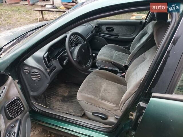 Зеленый Рено Лагуна, объемом двигателя 2.19 л и пробегом 400 тыс. км за 1750 $, фото 5 на Automoto.ua