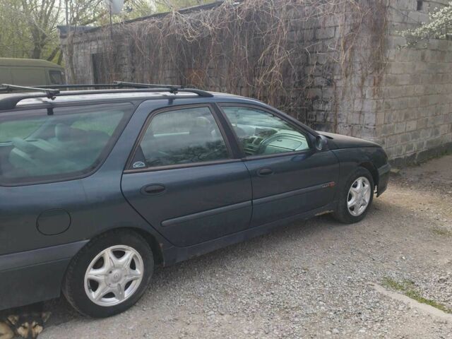 Зеленый Рено Лагуна, объемом двигателя 1.9 л и пробегом 400 тыс. км за 2800 $, фото 2 на Automoto.ua